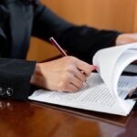 Estate planning attorney reviewing documents with clients in Austin Texas