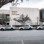 Criminal defense attorney reviewing case documents in Miami Florida