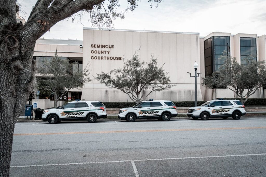 miamicriminaldefenselawyerfl ReachAttorneys Criminal defense attorney reviewing case documents in Miami Florida