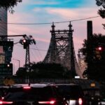 immigrationlawyerqueensny ReachAttorneys Queensboro Bridge at sunset connecting Queens and Manhattan New York